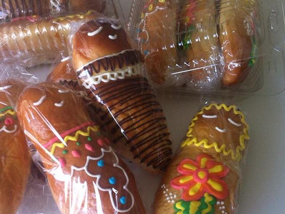 Guaguas de pan empacadas individualmente en fundas transparentes
